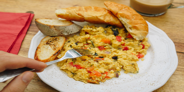 plate with scrambled eggs and toast